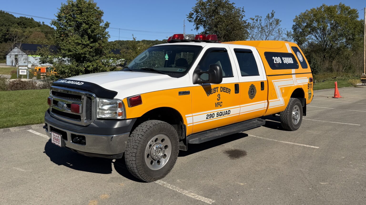 West Deer VFC 290 Squad rescue truck parked in an asphalt lot.